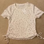 Elodie  cropped top. S Photo 4