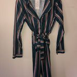 Sit Pretty And Apply Pressure Jumpsuit Green Photo 2