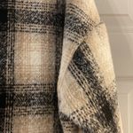 Altar'd State Very cute, oversized, shacket. Perfect to pair with a dress and thigh high boots Photo 6