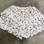 Love Shack Fancy Dainty ruffle ditsy floral coquette flowy shorts Photo 0