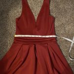 Boohoo  Maroon sleeveless mini dress with skater skirt and deep v neck Photo 7
