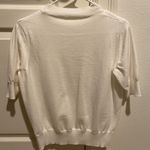 White size small short sleeved sweater Photo 1