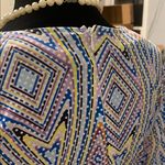 Geometric Patterned V Photo 2