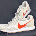Nike Cream and Orange Sneakers Photo 0