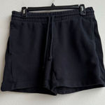 Aritzia TNA Cozy Fleece Boyfriend 5” Inseam Mid Rise Black Shorts Size Medium Photo 0