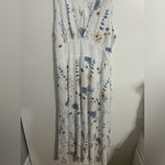 White dress with flowers. Used but in good condition. Size 14 Photo 1