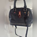 Black Handbag with Gold Accents Photo 2