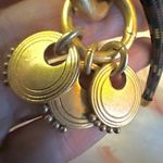 Gold tone pendant necklace on cord Photo 3