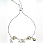 NWT Platinum and Yellow Gold Plated 18k FAITH Bolo Charm Slide Bracelet Silver Photo 0