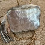Victoria's Secret Victoria Secret purse/elegant bag. New with tags. Purse is silver. Strap is gold Photo 7