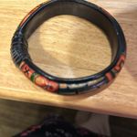 Very cute bracelet. It appears that it’s wrapped in leather at one end.​ Photo 2