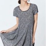 Urban Outfitters -SILENCE + NOISE Adorable black and white fit and glare dress, black tattered gem, short sleeves, back zipper, excellent condition, size small Measurements: Bust: armpit to armpit 16 inches Length: shoulder seam to bottom 29 inches Photo 2