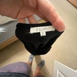 Black strapless dress with a high slit Photo 3