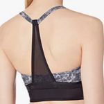 Under Armour  strappy black and gray sports bra low cut size small workout bra​​​ Photo 1