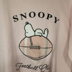 Snoopy laying on Football Sweatshirt women's XS Pink Photo 1
