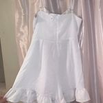 Showpo White Ruffle Tie Romper Photo 1