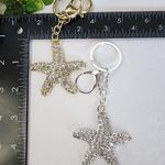 Silver and Gold Crystal Embellished Starfish Purse Charm Keychain Photo 3