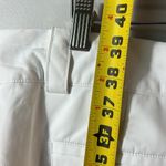 Nike  Women’s Dri-Fit White Golf Pants. size 12. zippered side pkts. EUC Photo 8