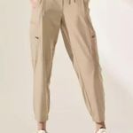 Athleta Go Far Travel Pant Joggers Athletic Tan Khaki Pants Size 0 Photo 0