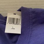 Disney NWT ’s Ariel Mermaid lyric gizmo purple t-shirt, size large. Photo 3