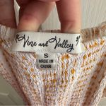 Vine & Valley white yellow diamond smocked jumper with leg slits size small Photo 4