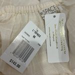 l*space 𝅺NWT Feelin’ Fine Dress Size M . This dress was only tried on to take pictures for the listing . Person wearing it is 5.5” and 135 lbs. Photo 11