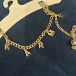 Urban Outfitters NWT  Gold Toned “Karma” Necklace Photo 4