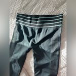 Fabletics  teal/turquoise and dark gray mid rise athletic leggings, size Medium Photo 1