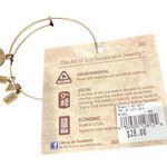 WIND & FIRE TREE OF LIFE Goldtone Bangle Sustainable Bracelet with charms Gold Photo 2