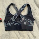 Under Armour Women’s Mid Impact Sports Bra Photo 1