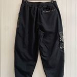 Nike  Sportwear Icon Clash Pants in Black Zippered Leg Pocket Detail Size M Photo 5