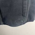 The North Face  black reversible black quilted hooded vest size small Photo 1