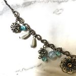 Silver tone blue faux pearl flower charm necklace Photo 6