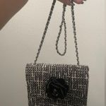 Camellia Black Tweed Clutch with Floral Accent Photo 8