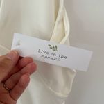 NWT Live in the moment White Body Suit size large with small cut out Photo 4