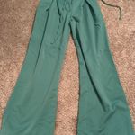 green tie waist trousers Photo 0