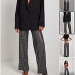 NA-KD  Low Waist Glitter Trousers Photo 1