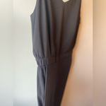 Uniqlo Black jumpsuit with pockets and cinched waist very elegant! Photo 7