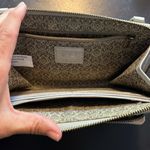 Joy Susan silver wristlet purse with credit card inserts and pocket. GUC. Photo 1