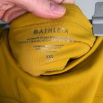 Athleta  Ultimate‎ Stash pocket mustard yellow size XXS like new 7/8 length Photo 3