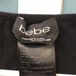 Bebe  Stretchy LS Bodysuit Black Gold silver studs Size M/L Stretch‎ Photo 3