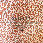 Athleta  Leggings Salutation Stash II Textured Tight Orange White Leopard Length Photo 5