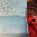 Michael Kors , and fair used condition billfold. I took pictures of the callouts​ Photo 7