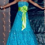 Tony Bowls Blue Strapless Gown with Green Sash Photo 0