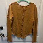 We The Free  Free People Long sleeve v neck sweater with raw edges. Photo 4