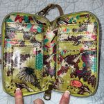 Sakroots  crossbody wristlet removable adjustable straps zip around close pockets Photo 4