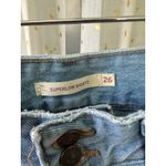Levi's Women's Superlow 5 Pocket Light Wash Distressed Raw Hem Denim Shorts 26 Photo 5