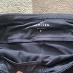 Athleta  black capri leggings, size small paired with H&M Hoodie S Photo 6