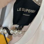 Le Superbe LUXURY White T Photo 2