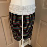 Billabong vintage black rainbow striped board swim shorts with white trim. M. Photo 5